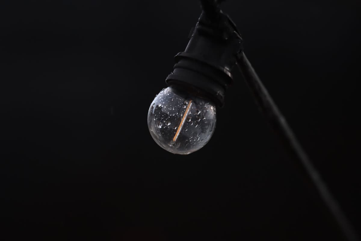 a single glowing filament in a dark labyrinth