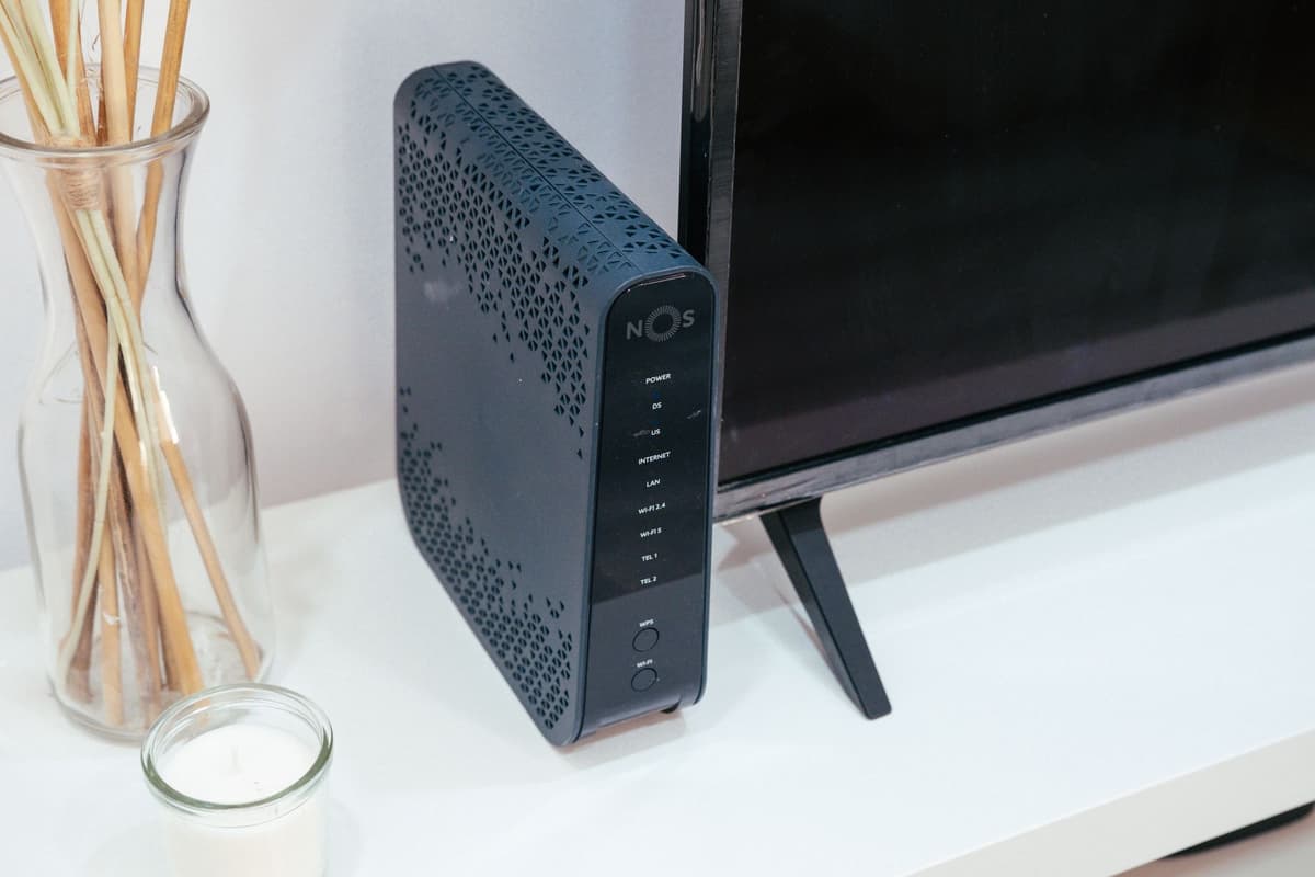 a dusty router with blinking red lights