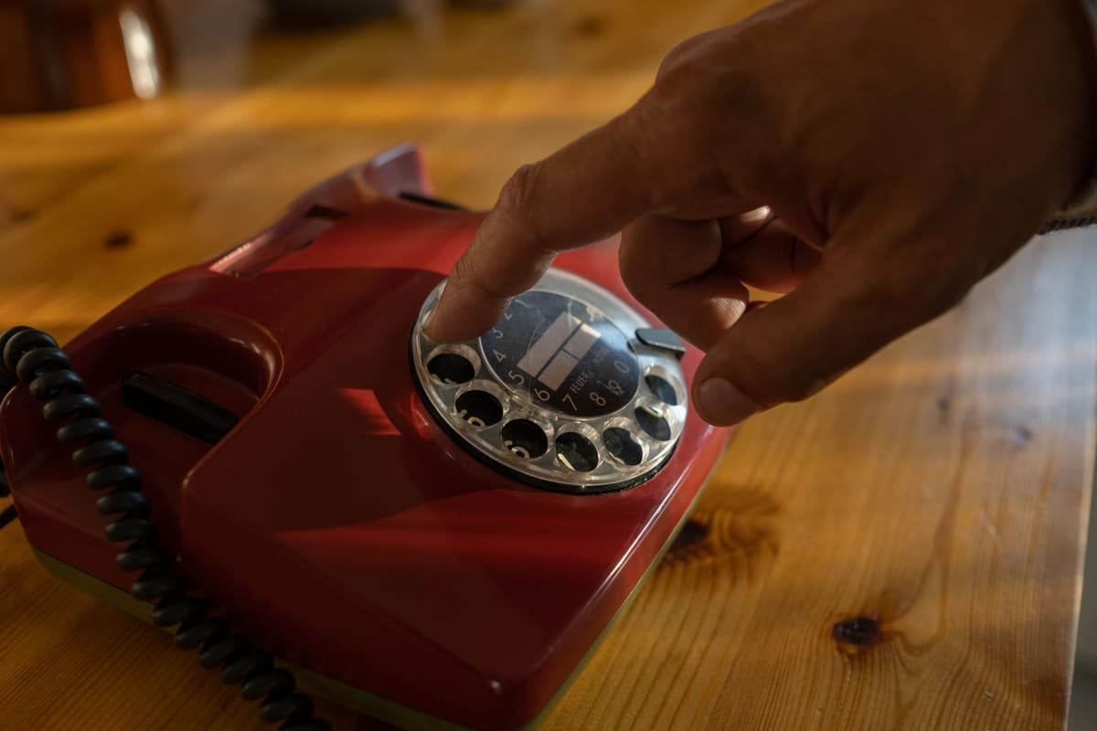 an old-fashioned analog telephone with a stethoscope attached to the receiver