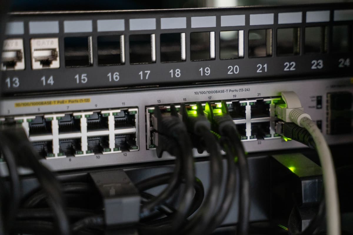 a single glowing ethernet cable plugged into an empty safe