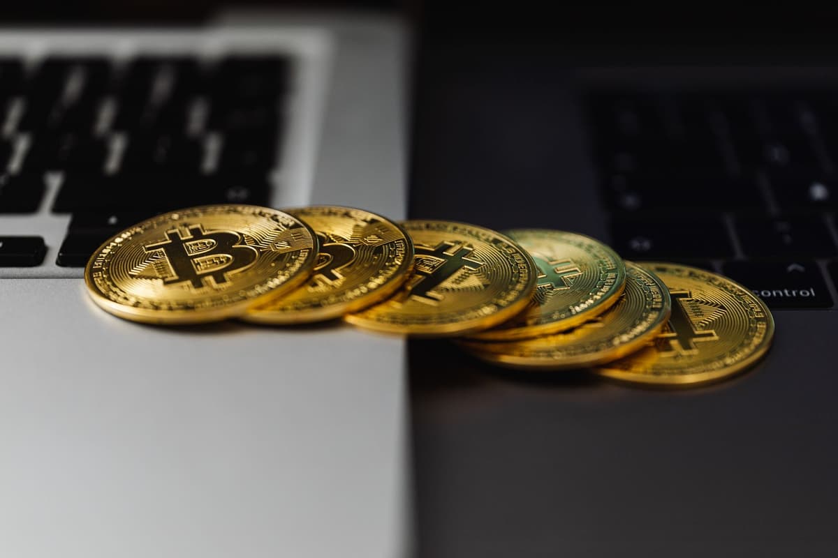 a literal pile of burning gold coins inside a high-tech laboratory