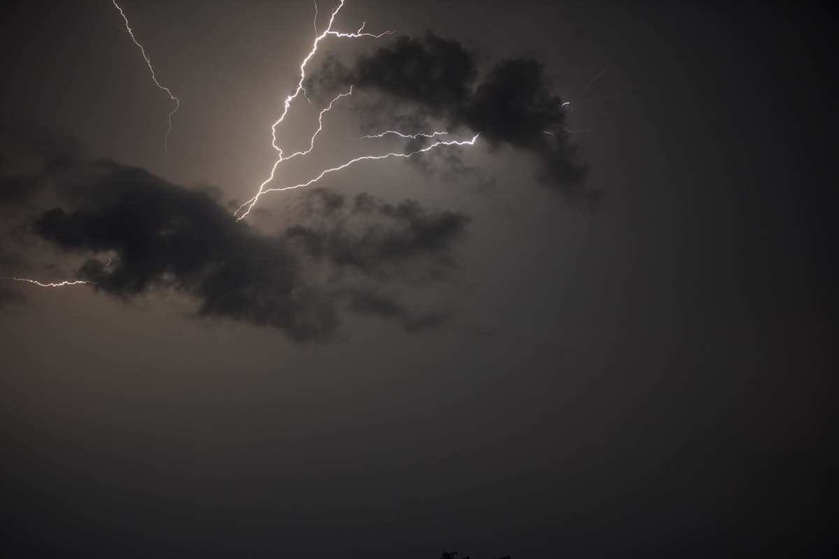 a single bolt floating against the blackness of space