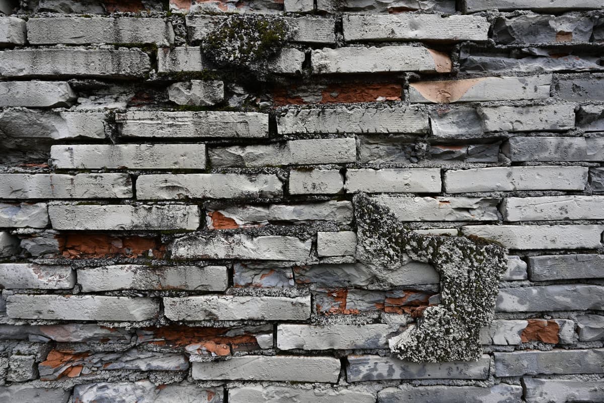 close up of weathered Roman brickwork and moss