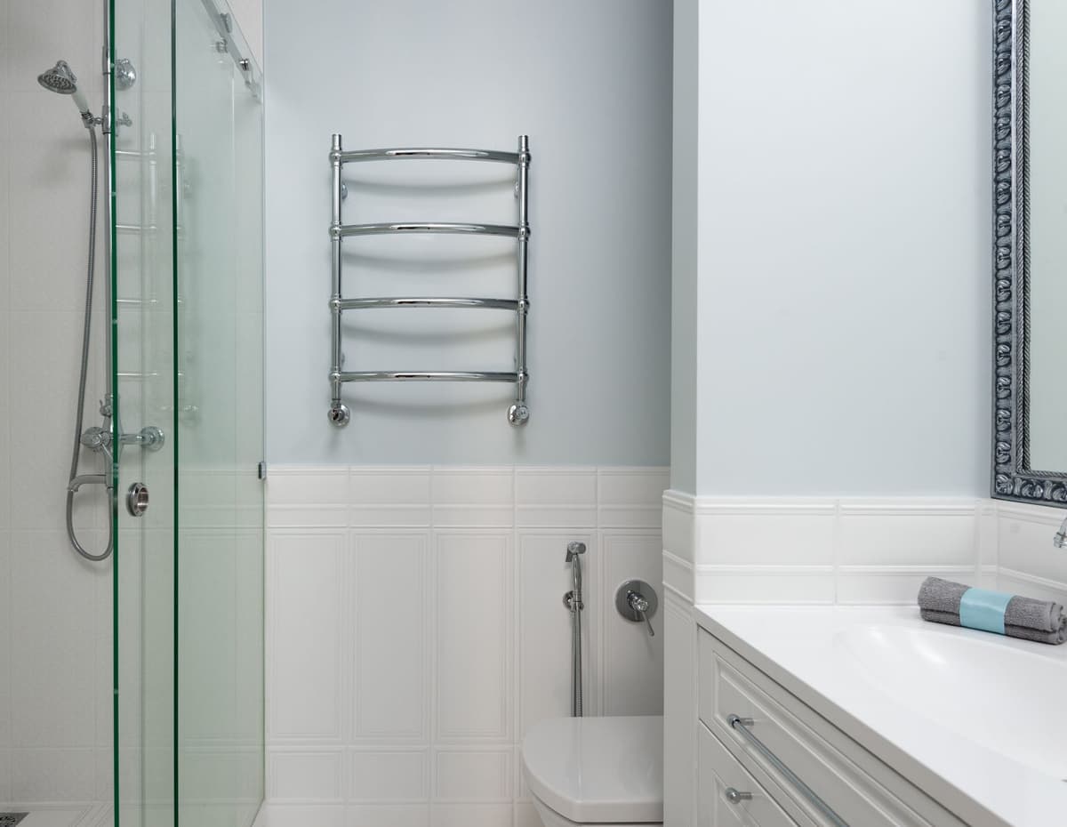 a server rack squeezed into a tiny bathroom cabinet