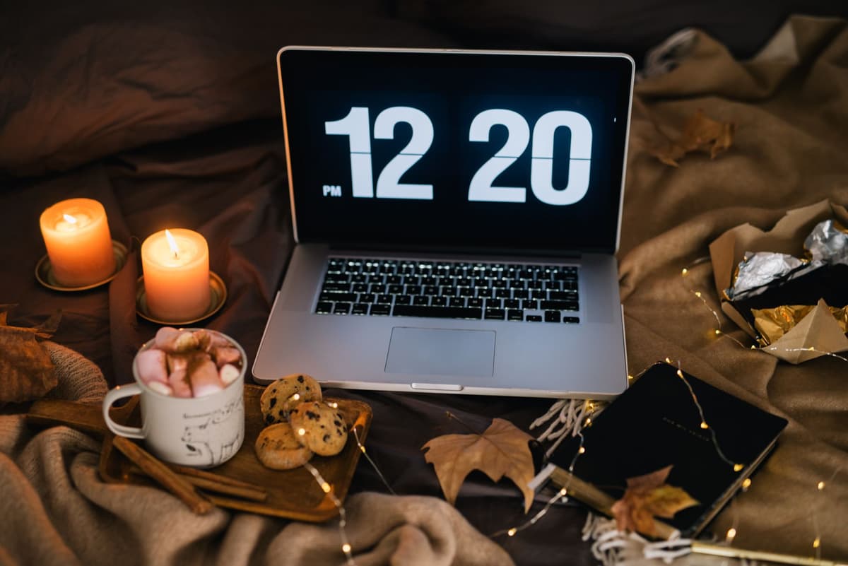 a laptop glowing red hot next to a donut